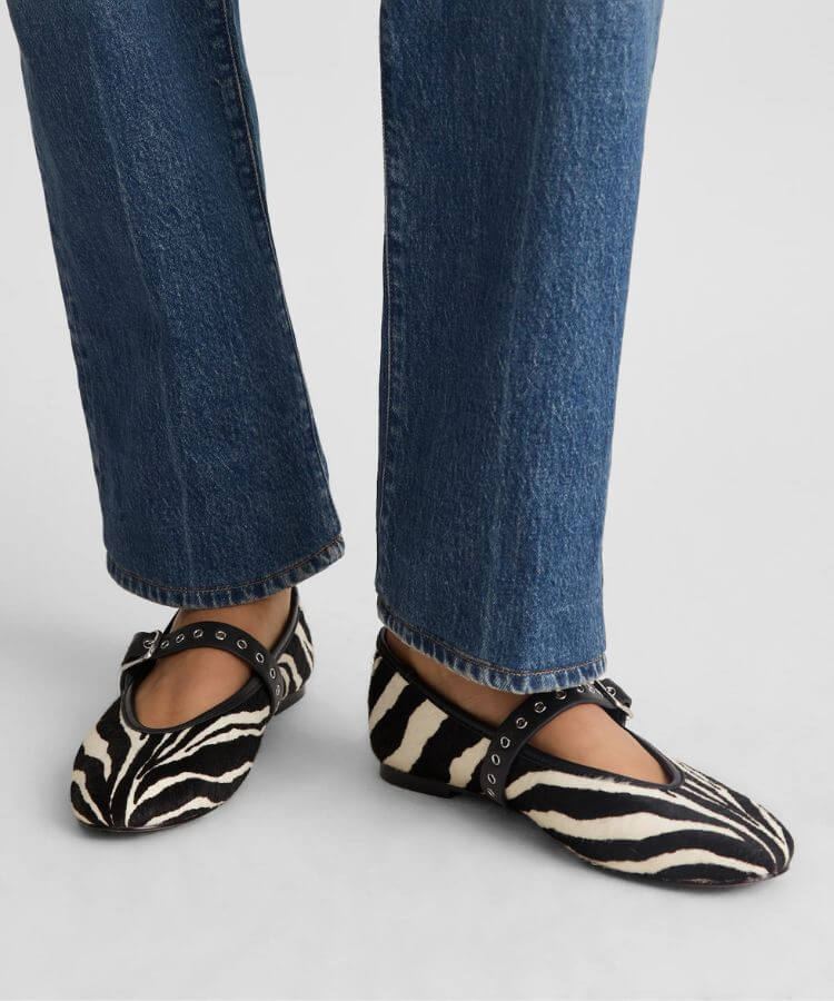 Madewell zebra-print Mary Jane flats.