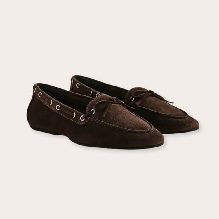 Reformation suede boat shoes in a minimalist style.