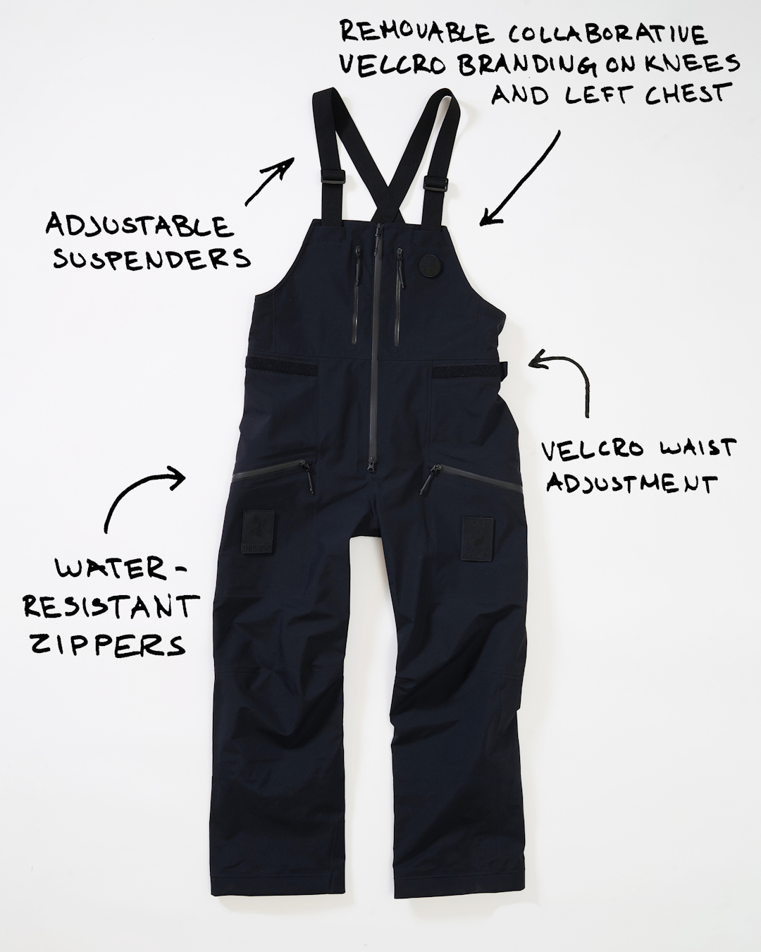 Technical flat-lay of black waterproof bib overalls with adjustable suspenders.