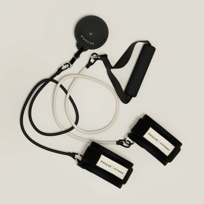 The Pvolve P.3 Trainer system featuring resistance bands and weighted ball.