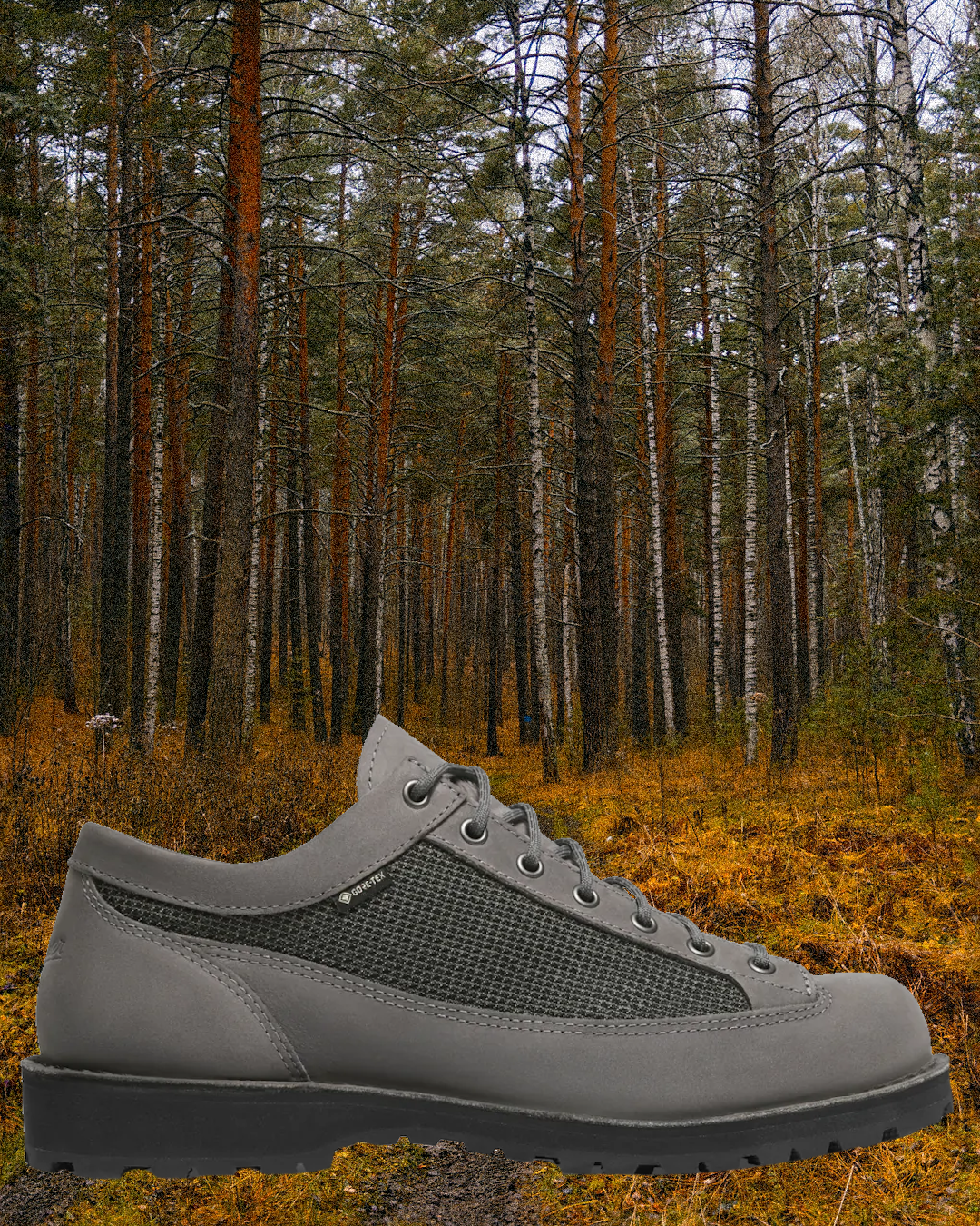 Macro detail of the Diemme Cornaro hiking shoe showing fine Italian suede and metal eyelets.