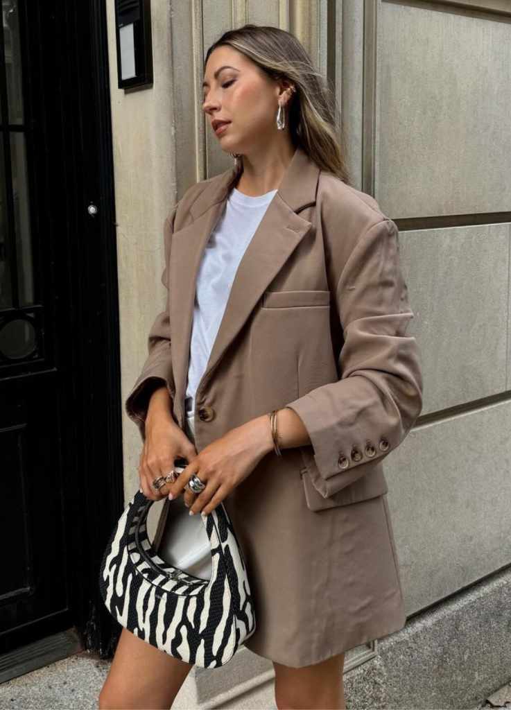 A street style shot of a woman looking polished and effortless.
