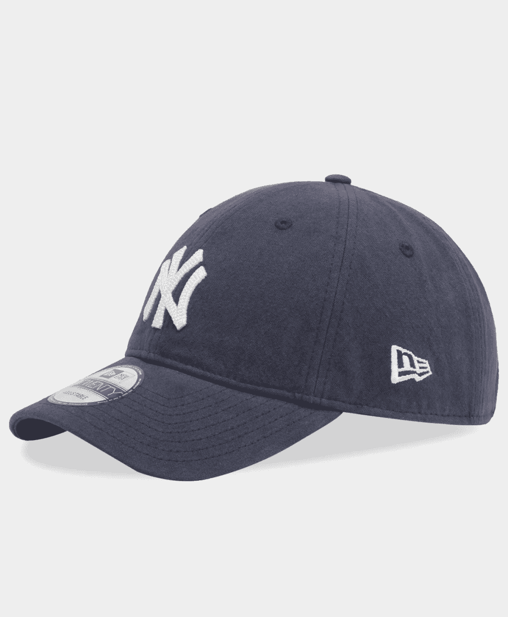 Navy blue New Era 9Twenty adjustable cap with white embroidered New York Yankees logo on the front.