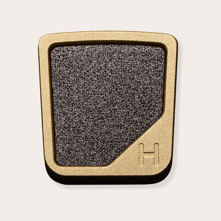 Single pan of Hourglass Ash Eyeshadow showing its cool-toned matte texture.