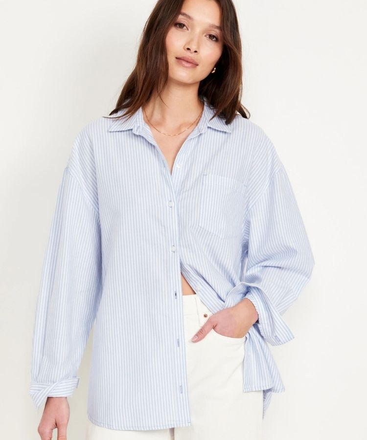 An oversized light blue button-down shirt.