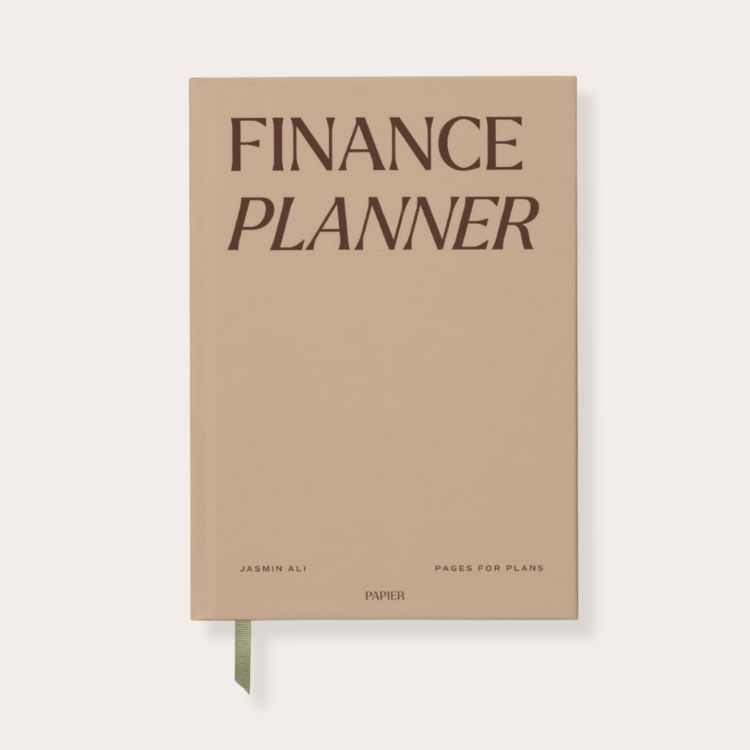 A high-detail shot of a Papier brand finance-specific planner.