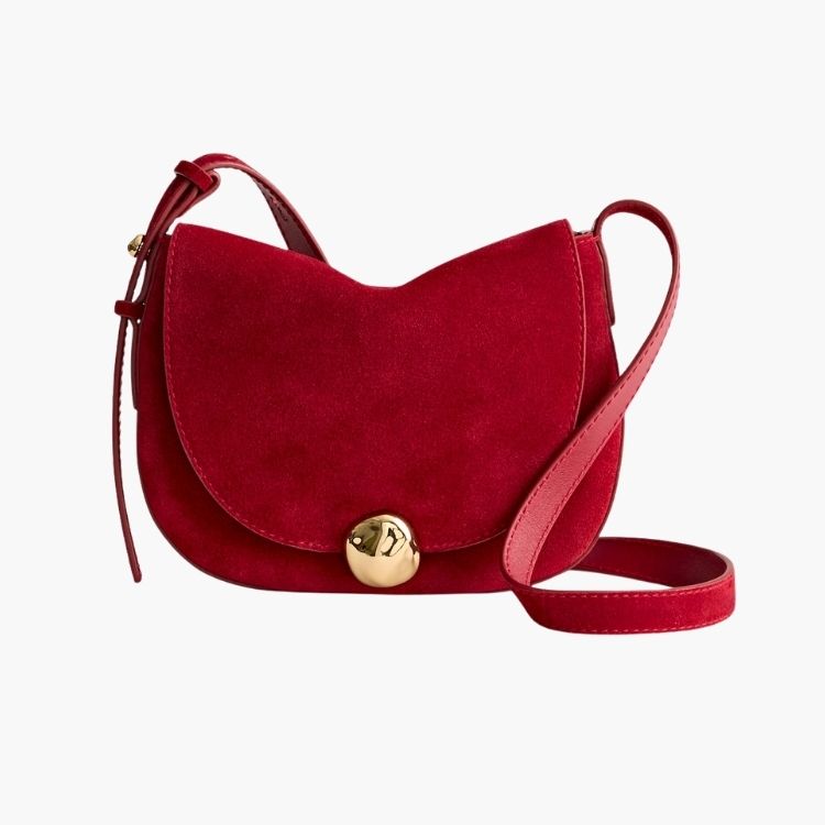 Dakota Saddle Crossbody bag in a clean, minimalist design.