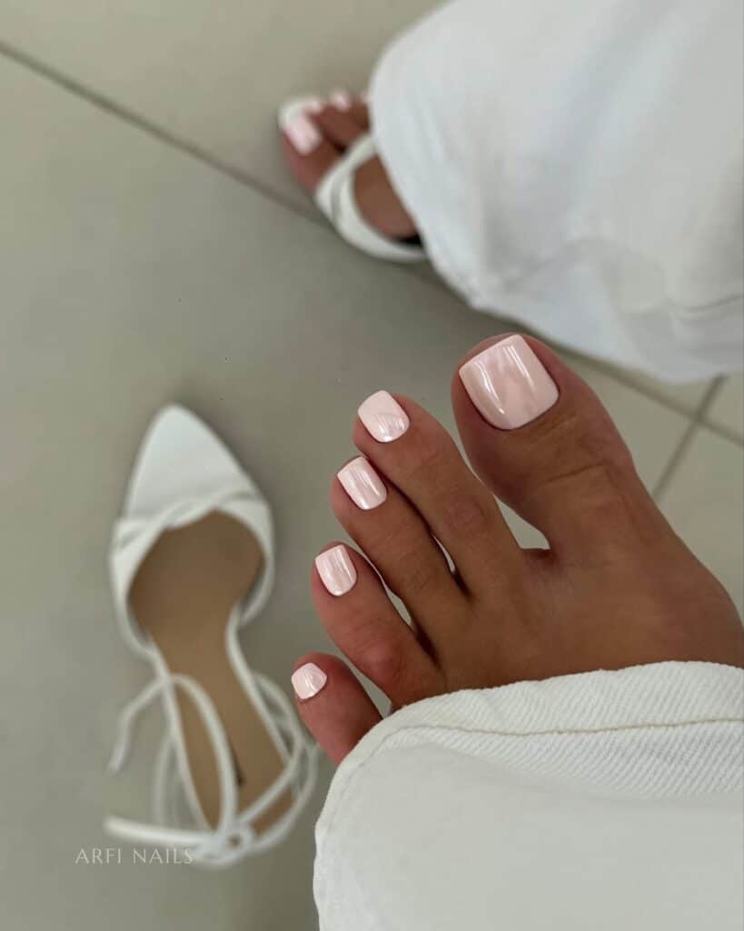 Close-up of the reflective particles in a chrome pedicure.