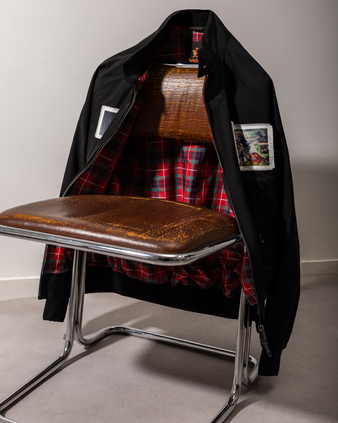 Interior shot of the Baracuta jacket folded open to reveal an all-over photographic print lining.
