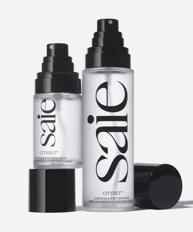 A professional model shot focusing on glowing, hydrated skin texture.