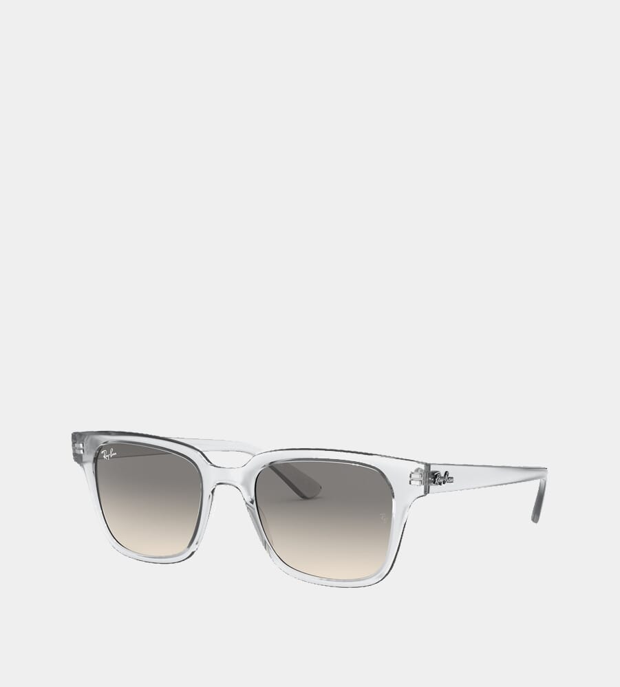Transparent frame Ray-Ban sunglasses with gradient gray lenses.