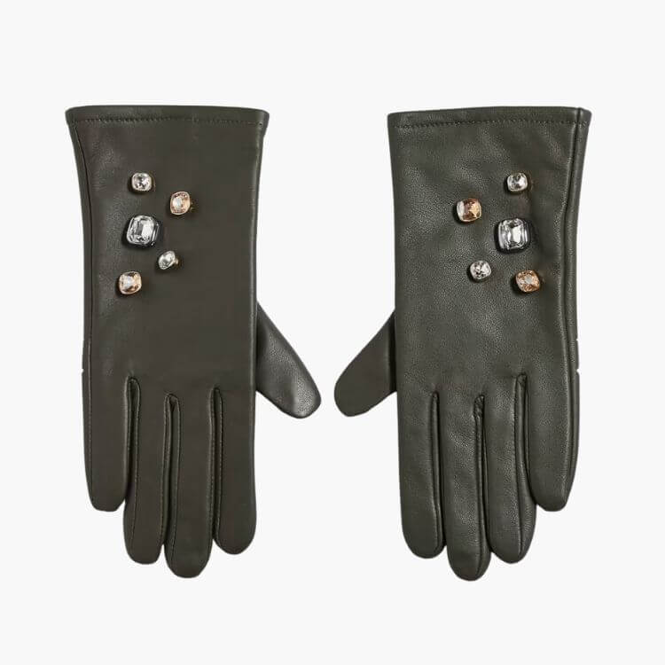 Black leather gloves decorated with various colorful gemstones.