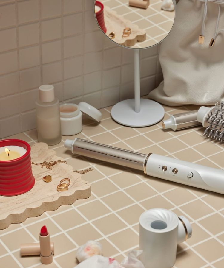 A person with healthy, shiny, professionally styled hair.