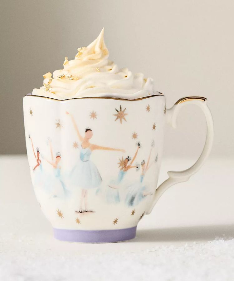 NYC Ballet themed stoneware mug with dancer illustrations.