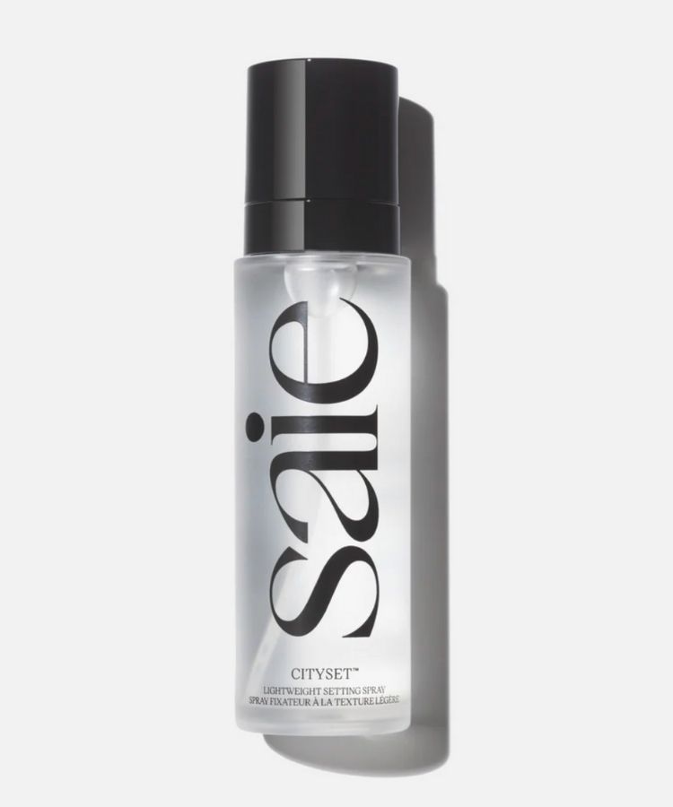 Standard size bottle of Saie CitySet Ultra-Fine Mist Setting Spray.