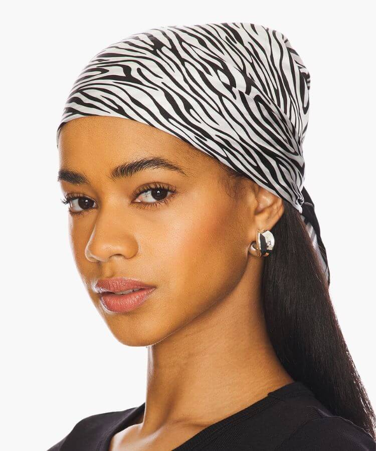 Petit Moments zebra-print scarf.