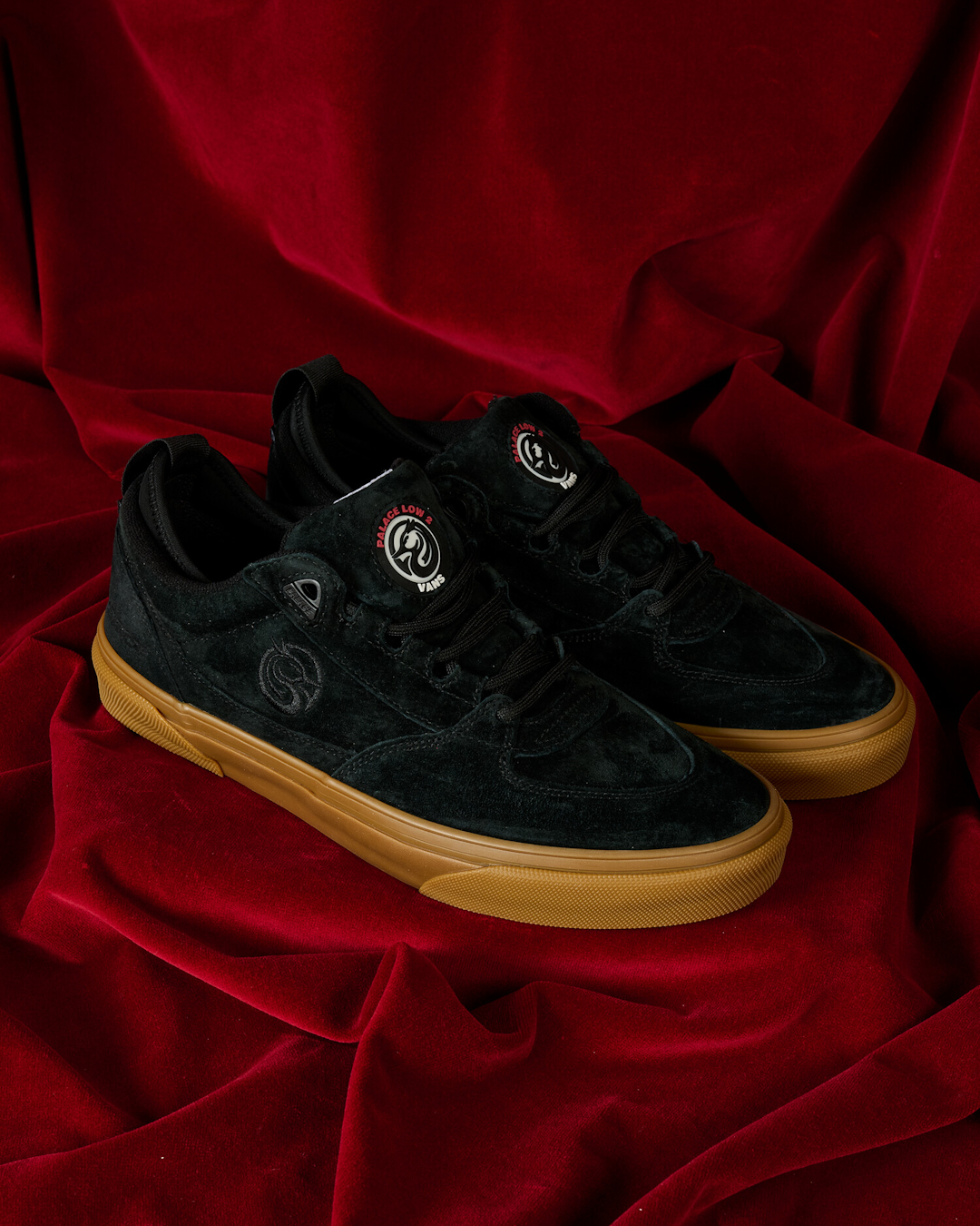 Studio comparison shot of the Black and Ecru colorways of the Palace x Vans Low 2.