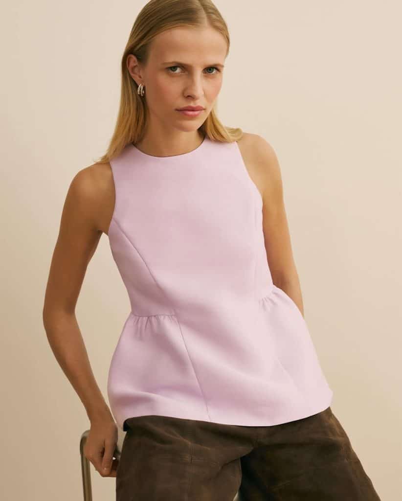 Structured blazer with sharp shoulders and clean lines from Aligne.