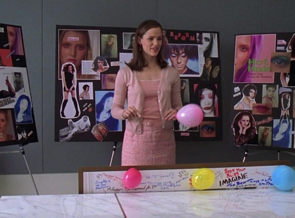 Jenna Rink from 13 Going on 30 wearing a pink cardigan.