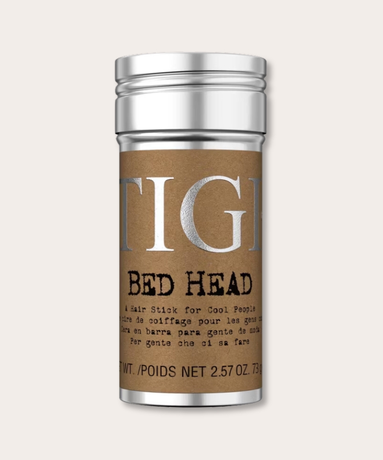 A container of hair styling wax.