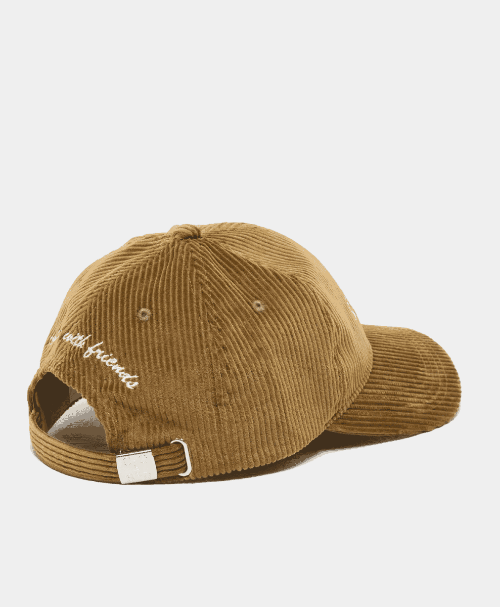 Rear view of a brown corduroy cap with 'with friends' embroidery and a metal buckle strap.